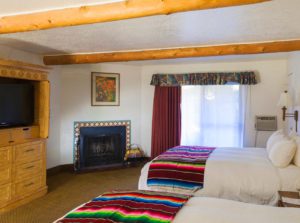 Hotel Room in Taos with Two Queen-Size Beds and a Fireplace